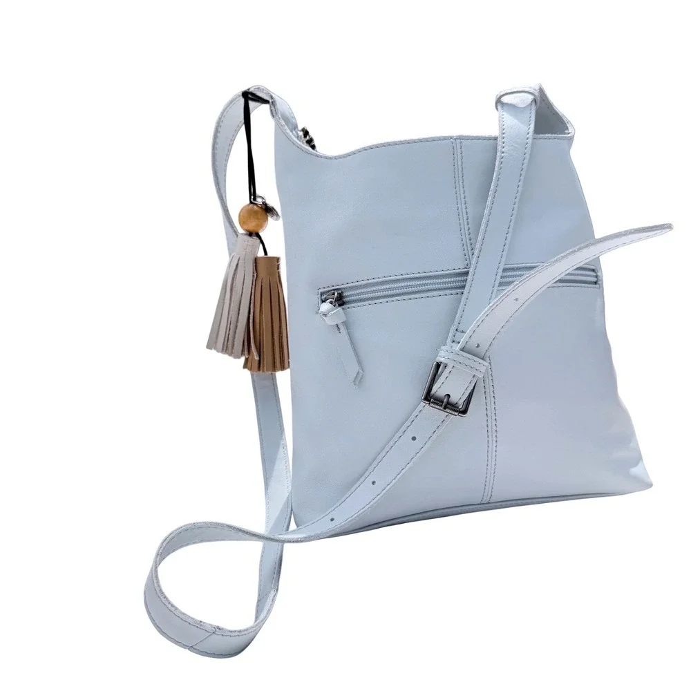 The Sak Huntley Chambray Blue Pebbled Leather Hobo Crossbody Bag Tassel Boho